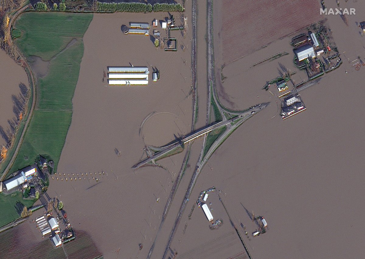 Flooded farms and highway is seen in an aerial view of the Sumas Prairie after an atmospheric storm struck between Nov. 14 and 15, 2021.