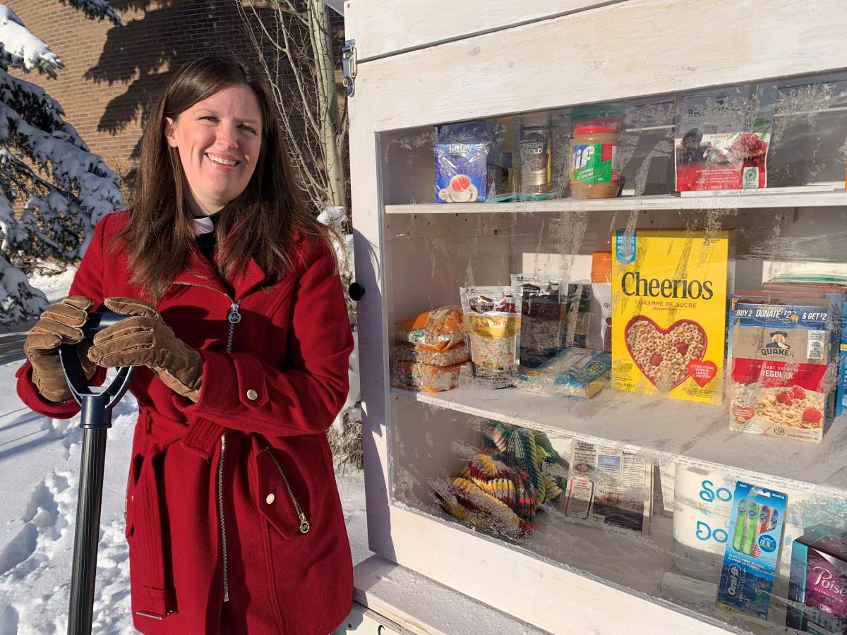 Ven. Jordan Haynie Ware, the rector of Good Shepherd Anglican Church in Castle Downs, stands in front of the community pantry. Nov. 19, 2021.