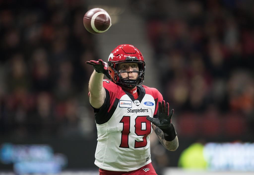 Calgary Stampeders quarterback Bo Levi Mitchell passes during first half CFL football action against the B.C. Lions, in Vancouver, Saturday, Nov. 2, 2019.
