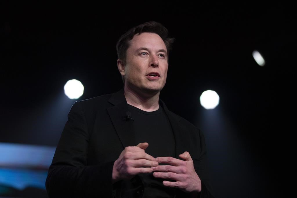 Tesla CEO Elon Musk speaks before unveiling the Model Y at the company's design studio in Hawthorne, Calif.