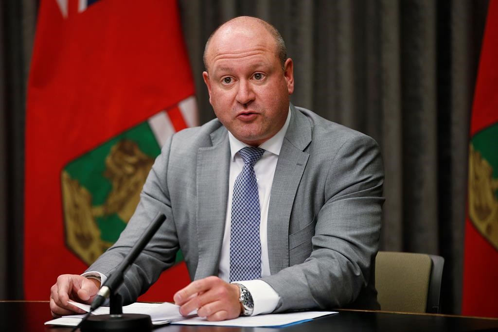 Dr. Brent Roussin, Manitoba's chief public health officer, speaks during a COVID-19 update at the Manitoba legislature in Winnipeg on Friday, Oct. 30, 2020. Roussin says more public health restrictions are coming as COVID-19 cases go up in the province.