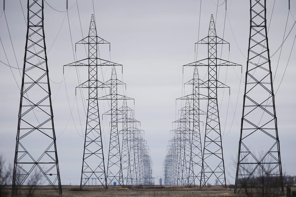 Manitoba Hydro power lines are photographed just outside Winnipeg, Monday, May 1, 2018. Manitoba's Crown-owned energy utility is now forecasting a deficit because of ongoing dry conditions. THE CANADIAN PRESS/John Woods.