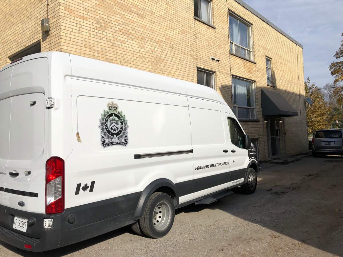 A London police forensic identification vehicle stationed outside of 69 Cartwright St. in London, Ont., for a suspicious death investigation, Nov. 11, 2021.