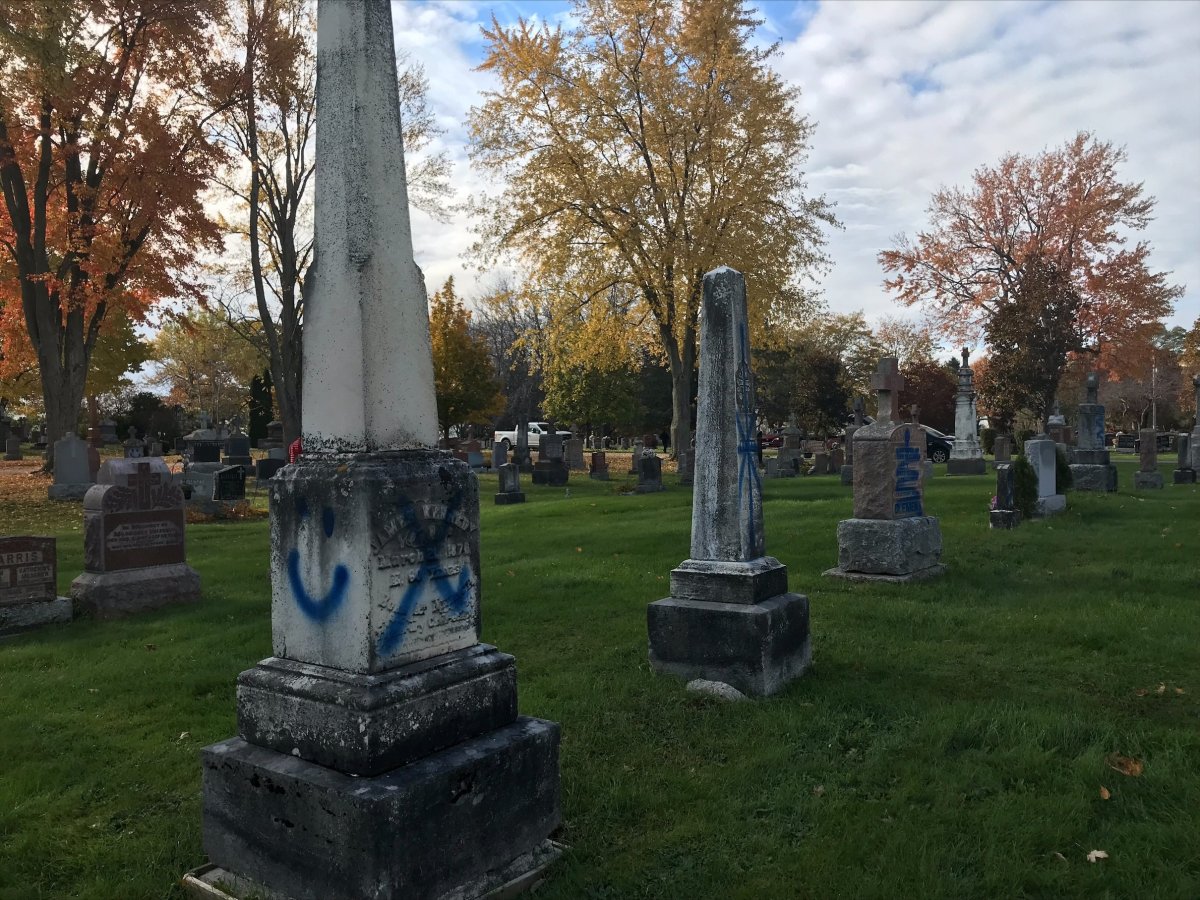 A woman who defaced hundreds of gravestones in the Belleville, Ont., area was sentenced to house arrest and community service Wednesday. 