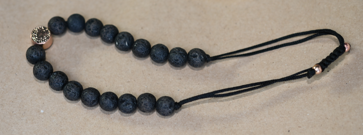 The bracelet the woman was wearing when she was found dead.