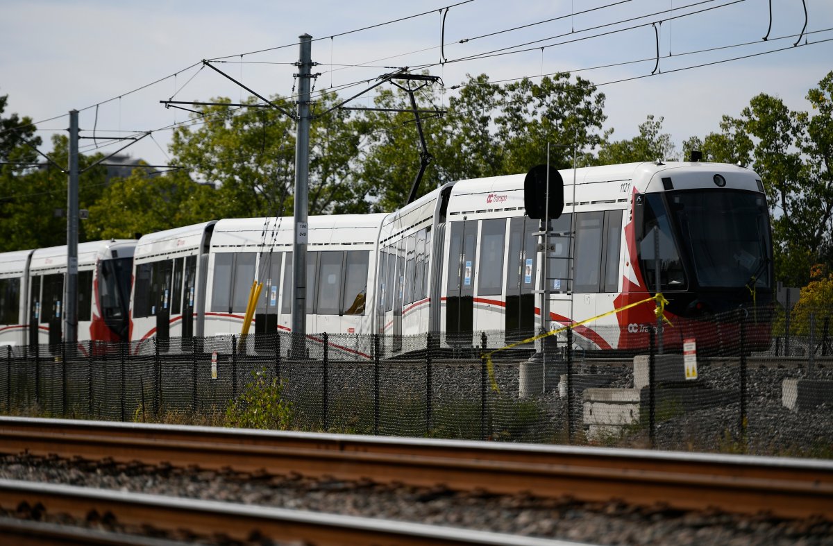 An OC Transpo O-Train is seen west of Tremblay LRT Station in Ottawa on Monday, Sept. 20, 2021 after it derailed on Sunday. The Ontario Ministry of Transportation is considering a judicial inquiry into the state of the city's LRT.