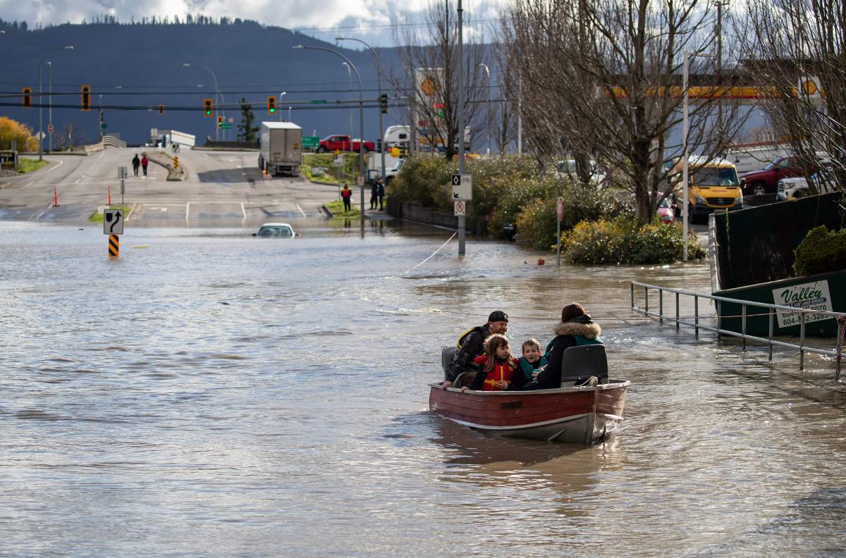Residents are seen in B.C. after a historic flood took place.