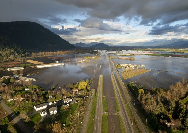 Flood waters cover highway 1 in Abbotsford, B.C., Tuesday, Nov. 16, 2021. THE CANADIAN PRESS/Jonathan Hayward.