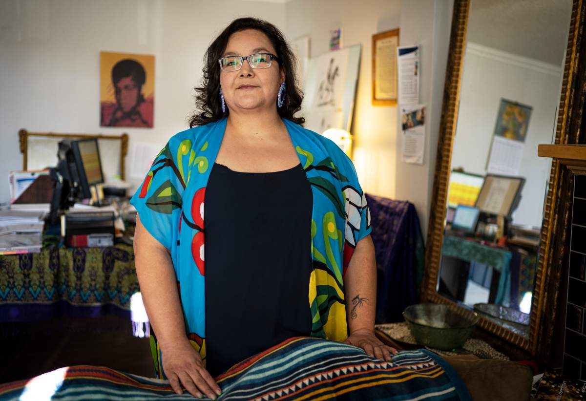 Theodora Warrior poses for a photo in Calgary, Alta., Friday, Nov. 19, 2021. Theodora Warrior is an Indigenous financial facilitator who grew up in poverty and is now helping to empower people in her community to manage their money.