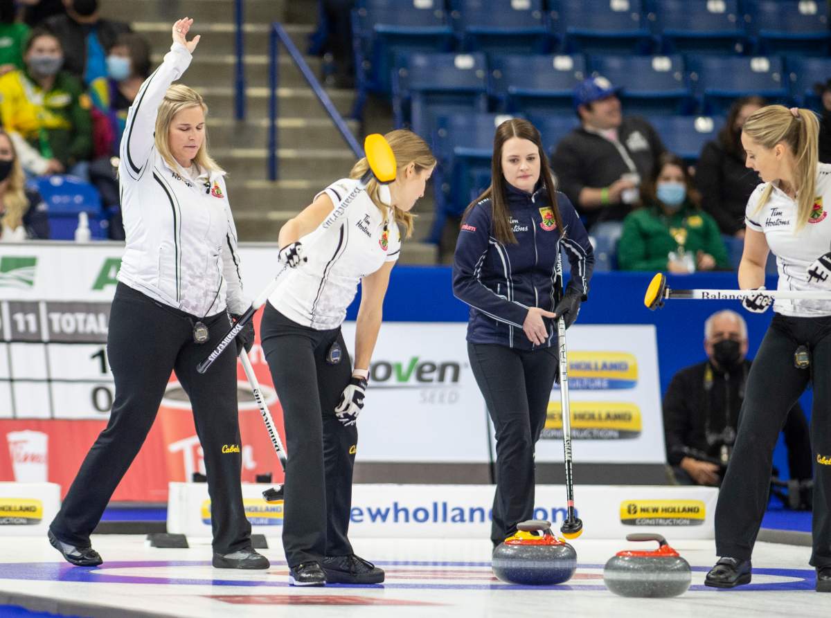 Team Jones skip Jennifer Jones confirming good shot as the rock comes to stop in the house against Team Fleury during woman’s final of the 2021 Canadian Olympic curling trials in Saskatoon on Sunday.