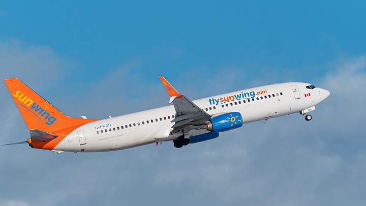 A Sunwing Airlines Boeing 737-800 (C-FWGH) single-aisle jet airliner airborne after take-off from Vancouver International Airport, Richmond, B.C. on Thursday, January 16, 2020.