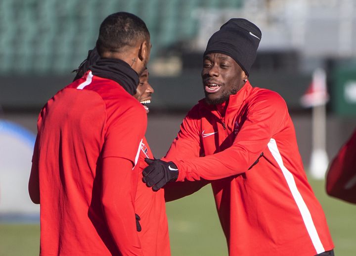 Team Canada’s Alphonso Davies has a laugh with teammates during a practice session in Edmonton, Alta., on Wednesday November 10, 2021. Canada takes on Costa Rica in their World Cup match on Friday November 12, 2021.