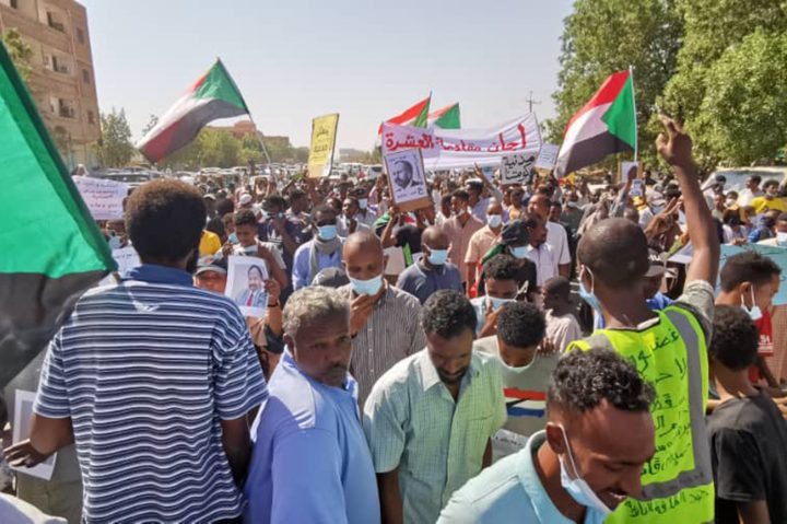 Sudanese anti-coup protesters take part in a demonstration in the capital Khartoum on November 13, 2021, two days after the military sought to tighten its grip by forming a new ruling council.