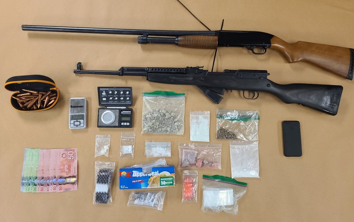A collection of items that police say officers seized after carrying out a search warrant at a location on Exeter Road.