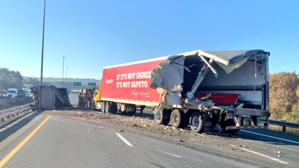 OPP say three vehicles were involved in a crash on Highway 403 in Hamilton the morning of Nov. 8, 2021.  A dump truck rolled over in the incident which was reported around 8: a.m.