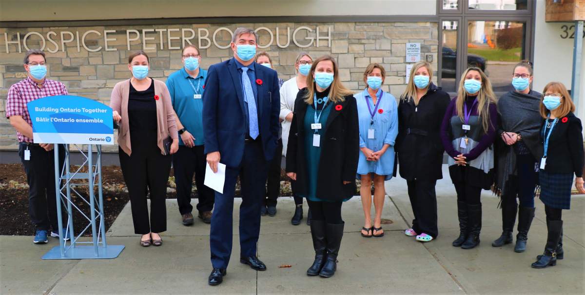 Peterborough-Kawartha MPP Dave Smith and Hospice Peterborough executive director Hajni Hős pose for photo Tuesday following a funding boost announcement from the province.