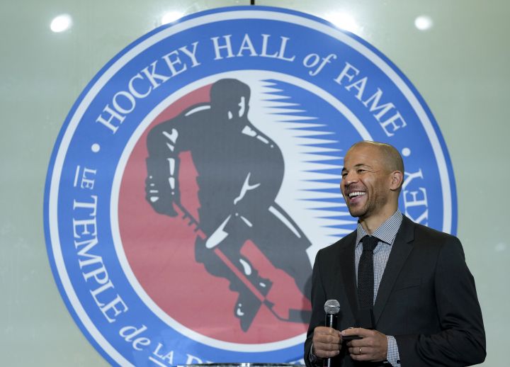 Hockey Hall of Fame inductee Jarome Iginla smiles after receiving his ring in Toronto, Friday, Nov. 12, 2021.