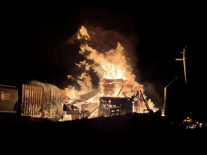 In this submitted photo, the last remaining grain elevator in Rouleau, Sask., is engulfed in flames.