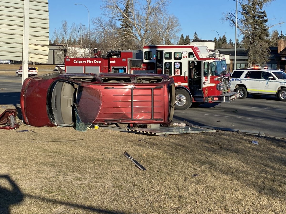 A vehicle is overturned near the corner of Macleod Trail and Willow Park Drive on Nov. 29, 2021.