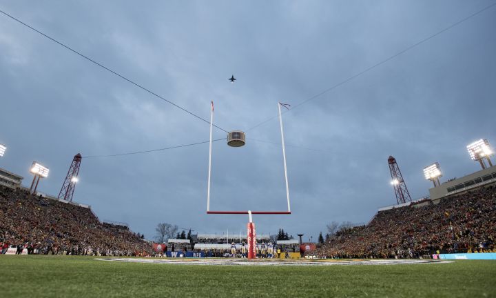 A Canadian Forces jet flies over McMahon Stadium during the 107th Grey Cup in Calgary, Alta., Sunday, November 24, 2019. 