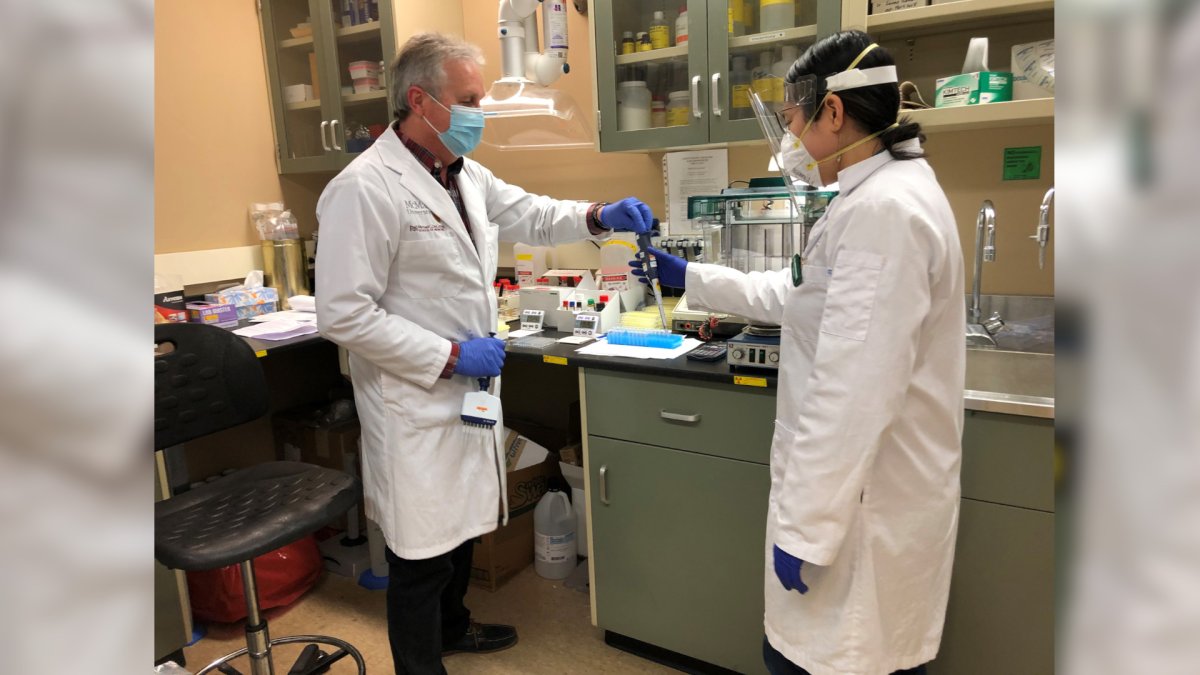 Technical director James Smith and research scientist Angela Huynh in the McMaster Platelet Immunology Laboratory.