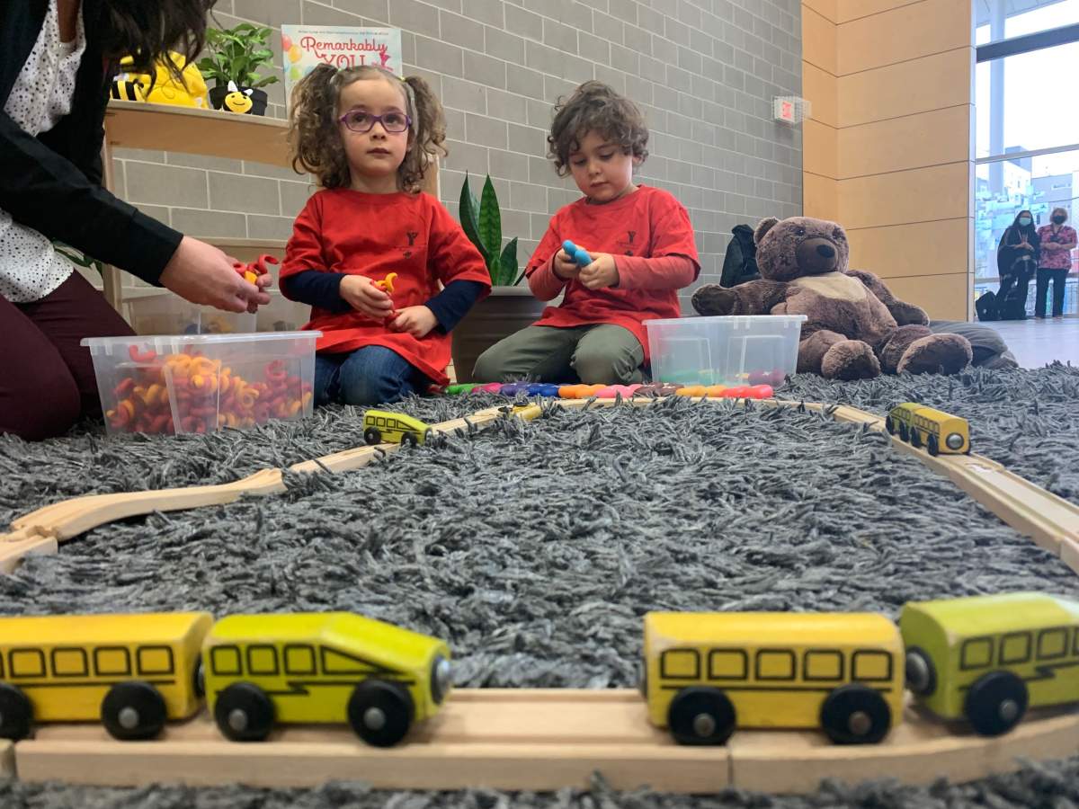Deputy Prime Minister Chrystia Freeland and Prime Minister Justin Trudeau speak with children before announce $10-day Alberta child care plan in Edmonton on Monday, Nov. 15, 2021.