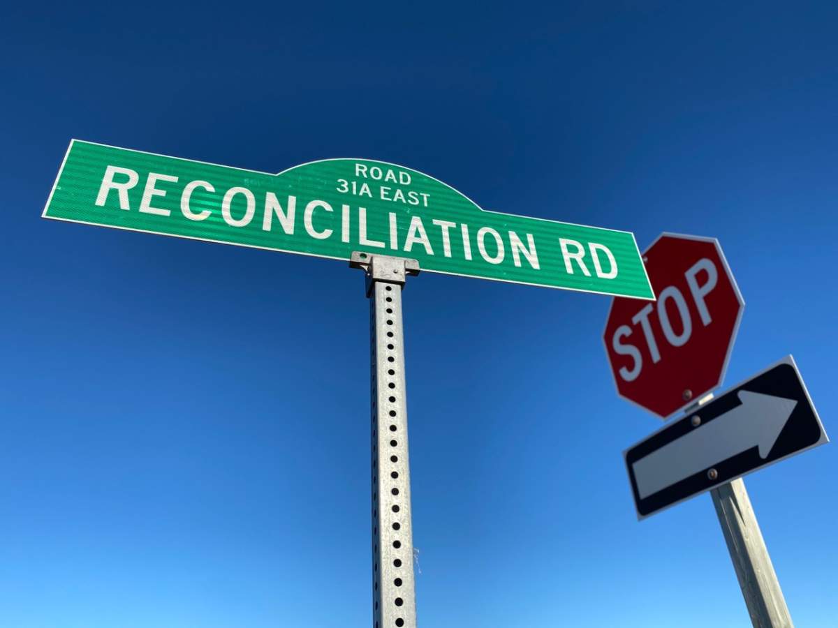 The new sign installed at the corner of Reconciliation Road and Hwy. 59.