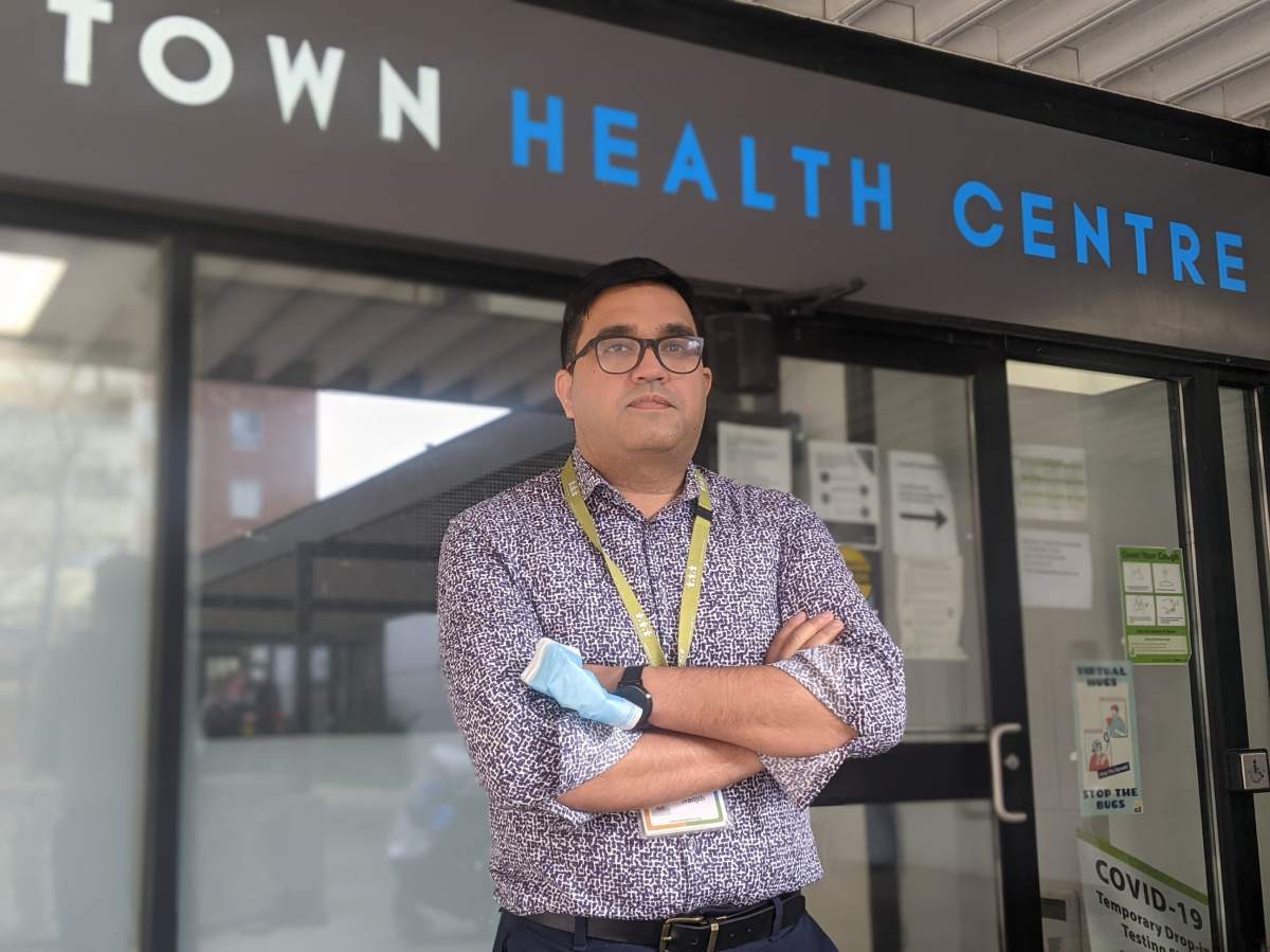 Nadjib Alamyar, manager of newcomer wellness at WoodGreen Community Services pictured outside Crescent Town Health Centre.