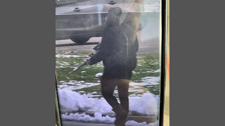 Provincial police published a photo, provided by a citizen, of a man who appears to be carrying a silver-barrelled firearm. Tuesday, Nov. 16, 2021.
