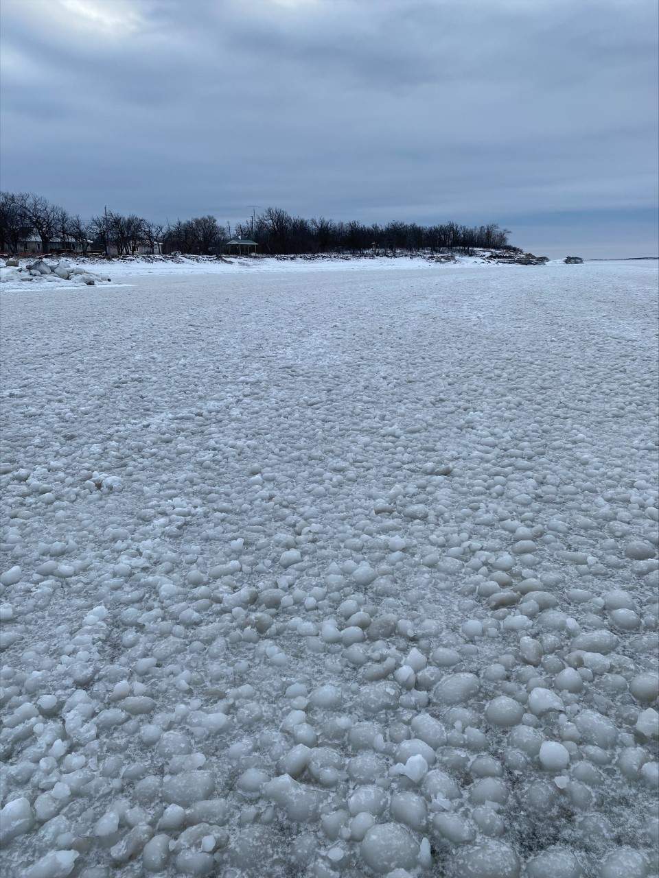 Rare phenomenon covers Steep Rock, Man. waterfront with icy orbs - image