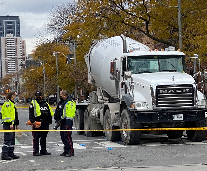 Police on scene after a female pedestrian was struck and killed in downtown Toronto.