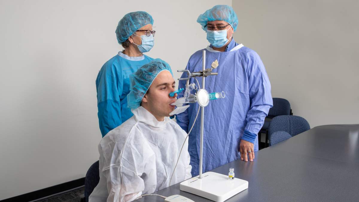 A team of scientists at McMaster University demonstrate how a new inhaled COVID-19 vaccine is administered directly into the lungs. 