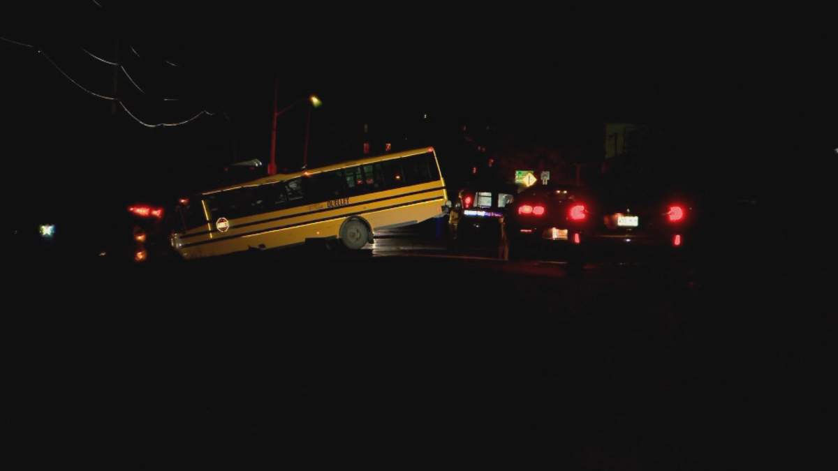 A five year-old boy has died and another is seriously injured after a school bus collided with a bucket truck Tuesday afternoon.