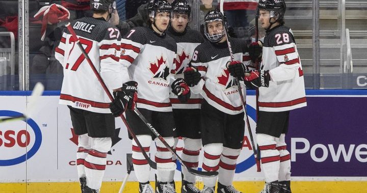 Connor Bedard scores 4 goals to enter record books as Canada wins 11-2 over Austria at world juniors