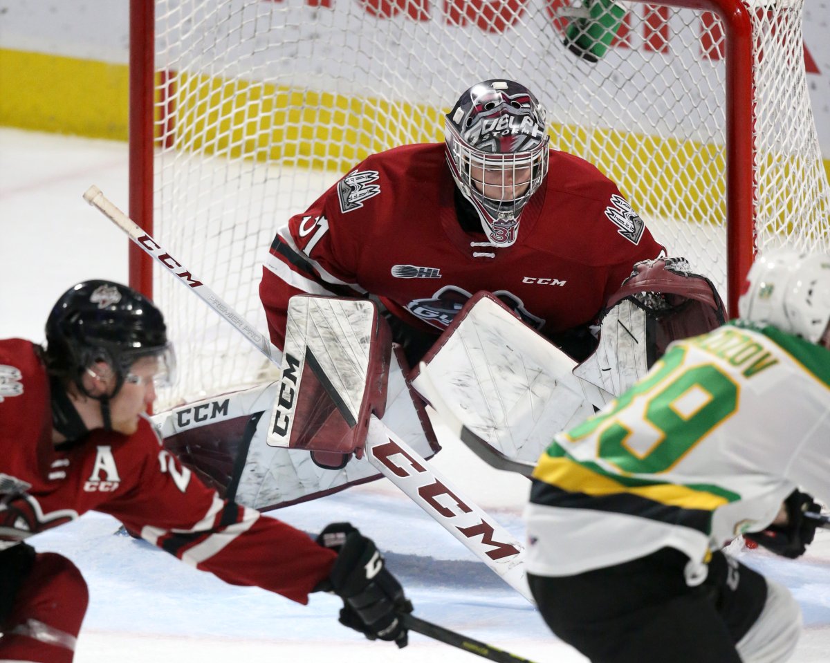 Owen Bennett of the Guelph Storm gets ready to make a save during a game against the London Knights on Dec. 18, 2021.
