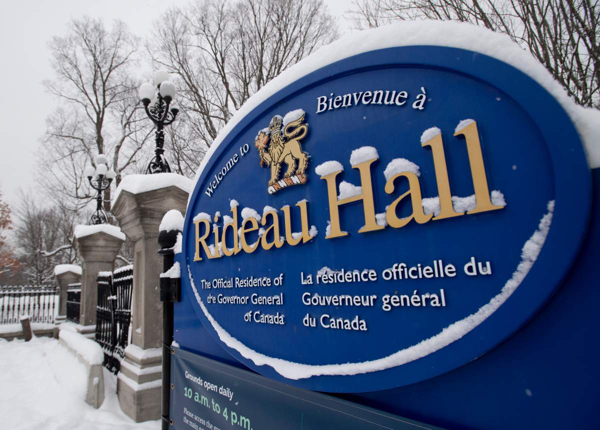 A sign along the wall surrounding Rideau Hall, Jan. 21, 2021. THE CANADIAN PRESS/Adrian Wyld