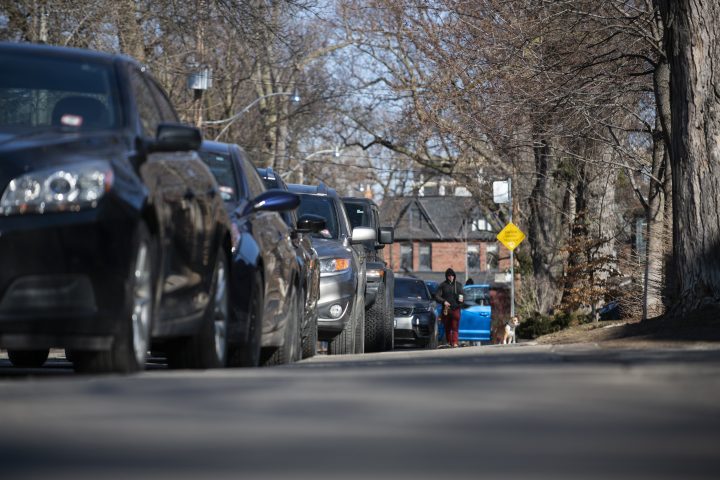 Cars parked on Albany Avenue in Toronto's Annex neighbourhood are photographed on March 15, 2021.
