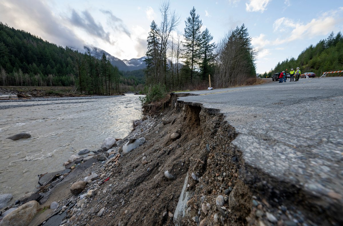 A section of road falls into the Coquihalla River near Hope, B.C., Thursday, Dec. 2, 2021.  