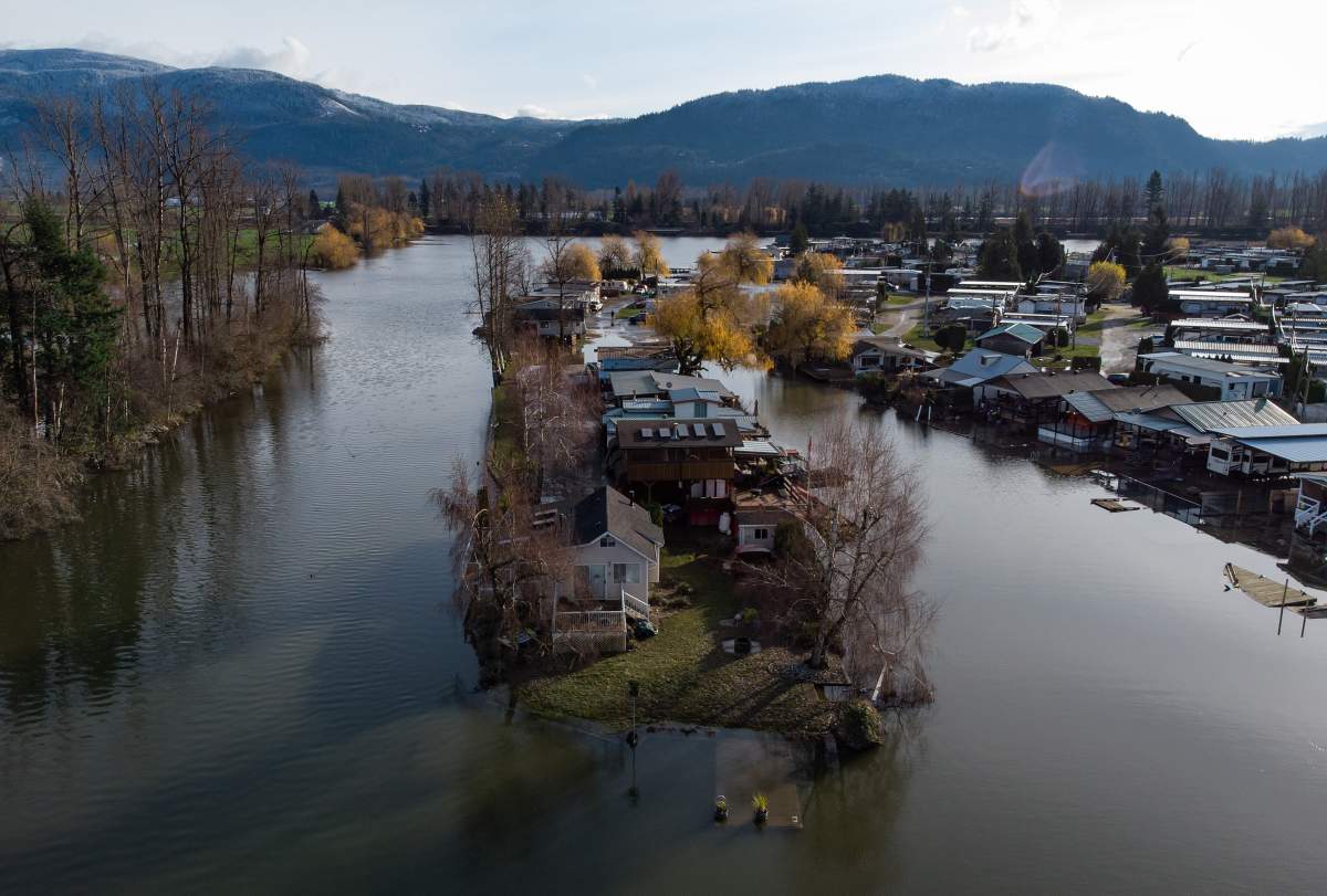 Properties are surrounded by high water after floodwaters began to recede at Everglades Resort on Hatzic Lake near Mission, B.C., on Sun. Dec. 5, 2021.
