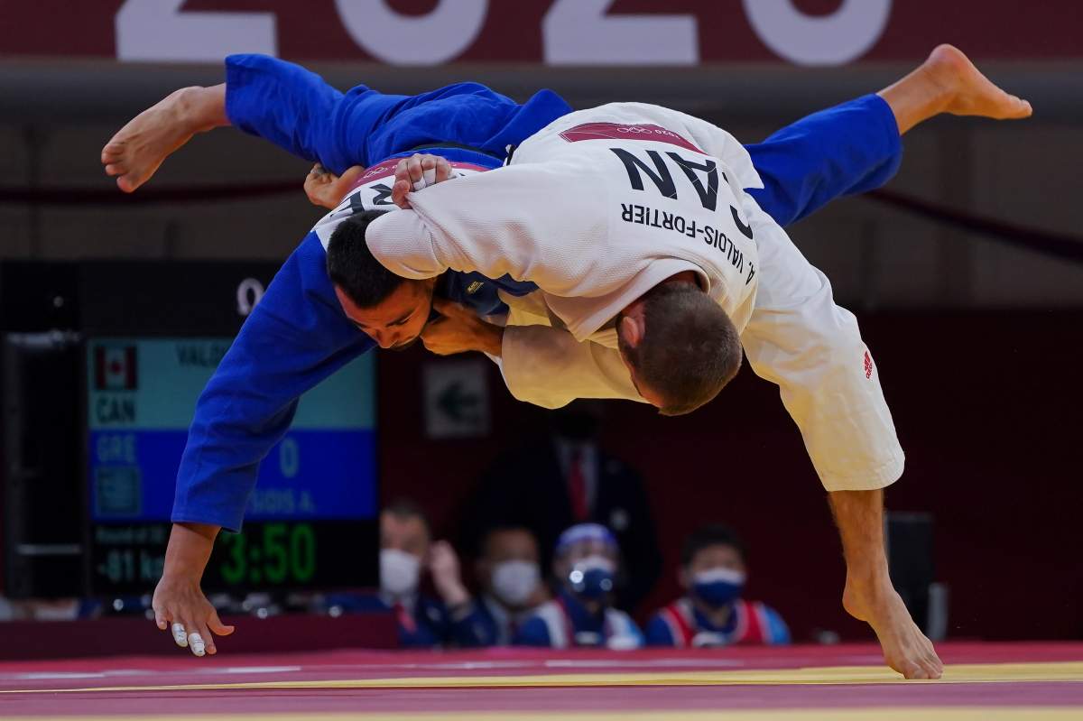 Antoine Valois-Fortier, right, of Canada competes against Alexios Ntanatsidis in the men’s judo 81-kilogram weight class during the Tokyo Olympics in Tokyo, Japan on Tuesday, July 27, 2021.