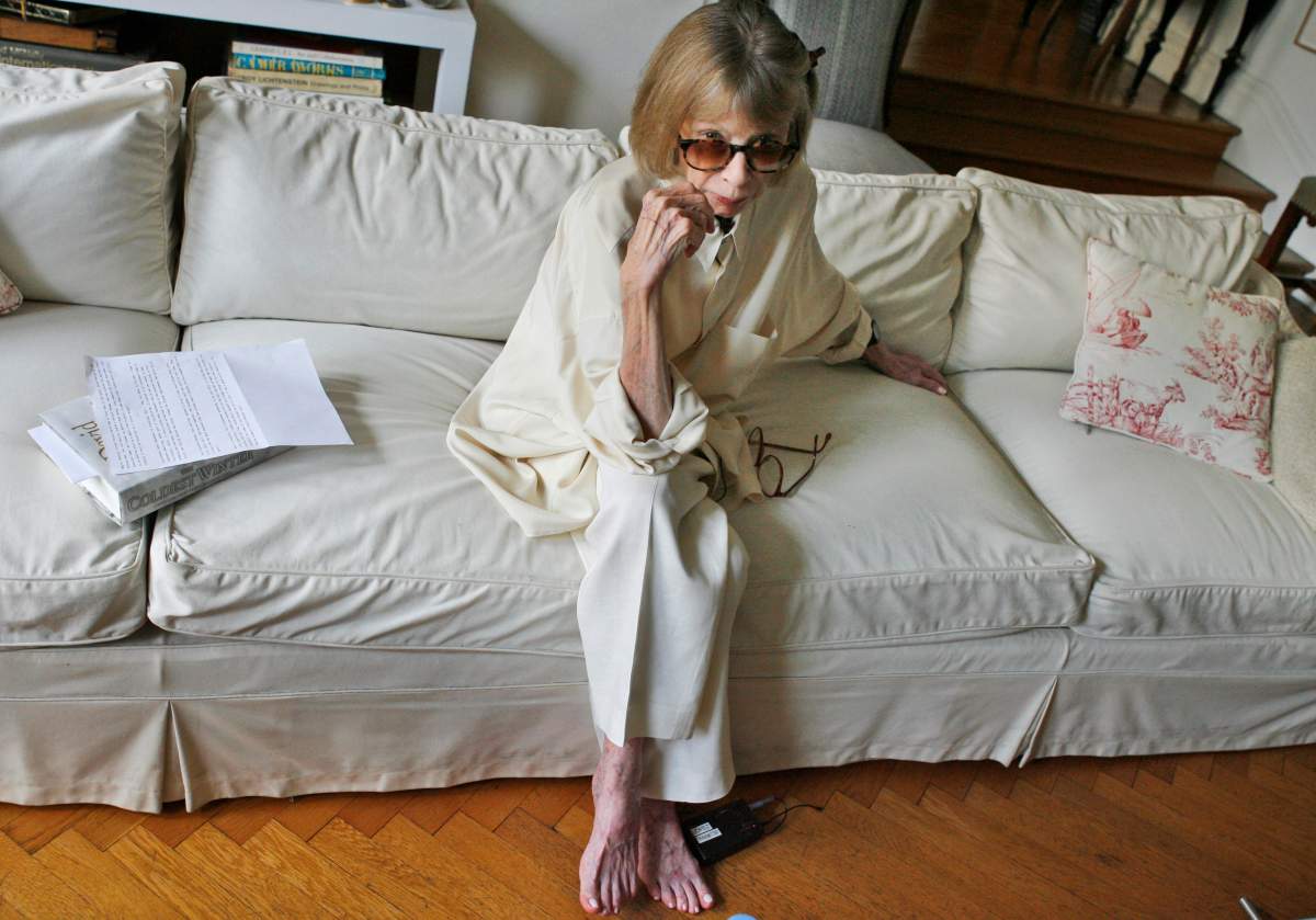 Author Joan Didion poses for a photograph in her New York apartment, Thursday, Sept. 27, 2007.