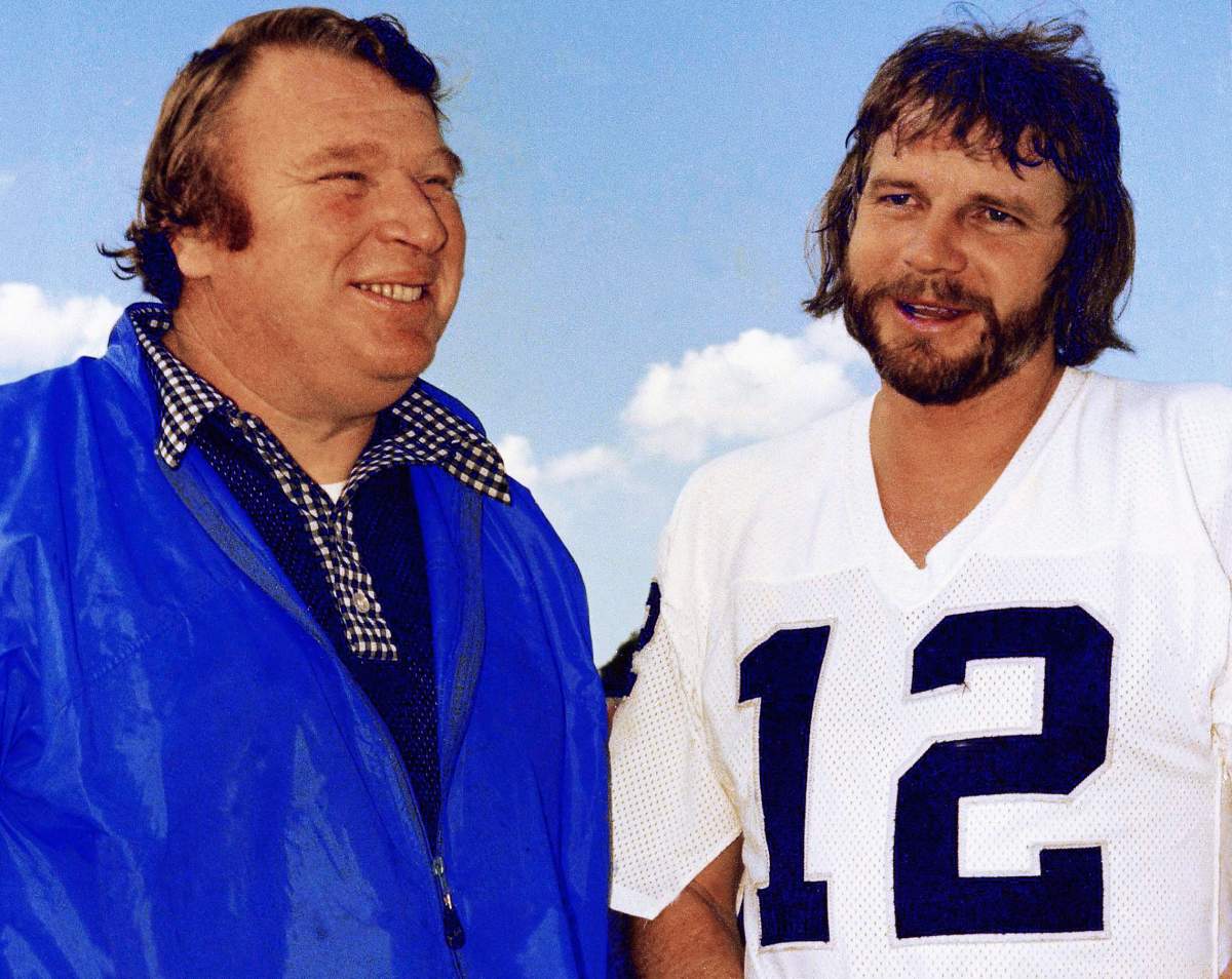 FILE – In this Jan. 4, 1977, file photo, Oakland Raiders quarterback Ken Stabler, right, talks with coach John Madden in Oakland, Calif. Madden called the shaggy-haired Stabler, whose wild style on the field and off helped earn him the nickname “The Snake,” the perfect Raider. The only thing missing when Stabler is inducted into the Hall of Fame on Aug. 6, 2016, will be Stabler himself. (AP Photo/George Brich, File)