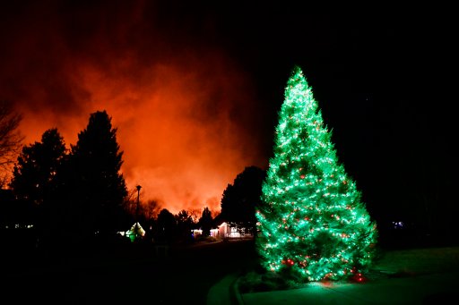 Colorado wildfires burn in the background of a neighbourhood on Dec. 30.