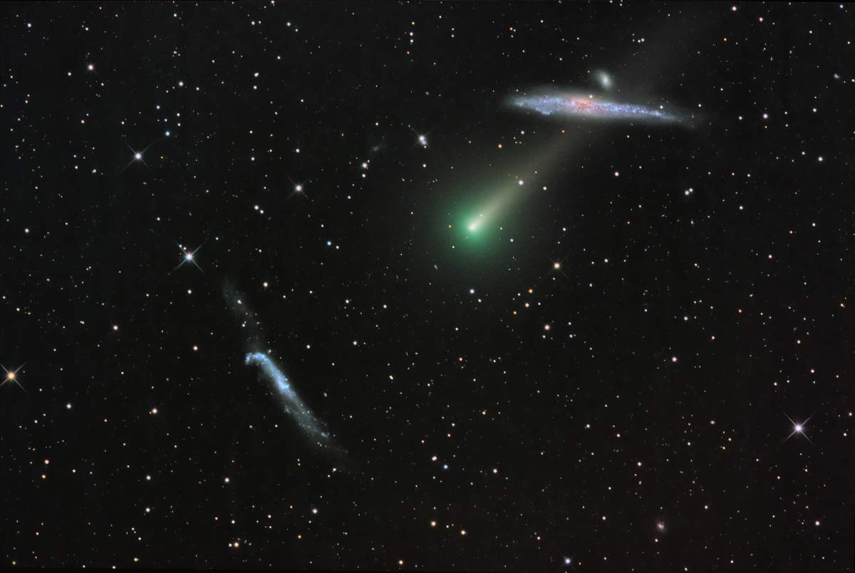 A photo of Comet Leonard taken on Nov. 24, with two galaxies in the background. The upper galaxy is known as the Whale Galaxy, while the lower galaxy is known as the Hockey Stick. Both are about 25 million light years away.