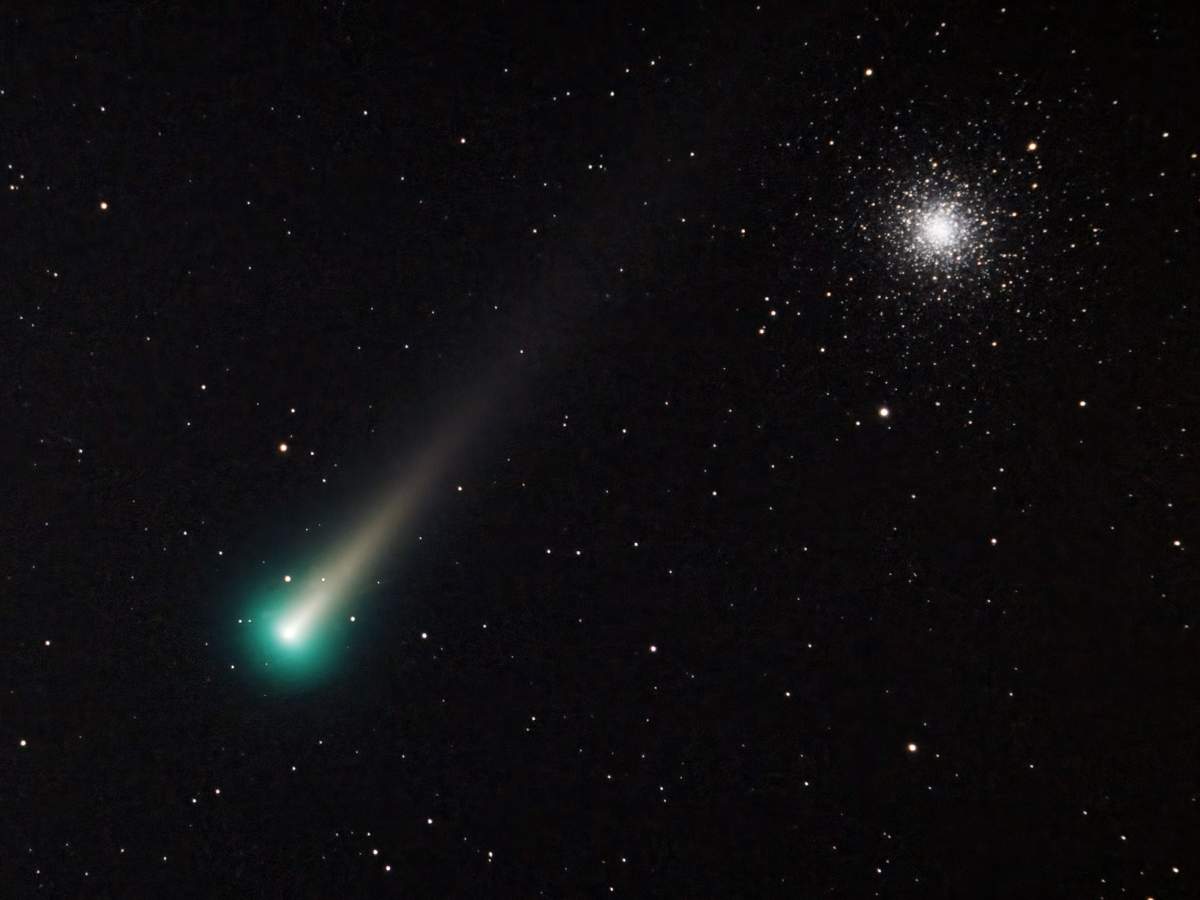 A photo of Comet Leonard, and a globular cluster of stars known as Messier 3 in the background. The photograph was taken on Dec. 3.