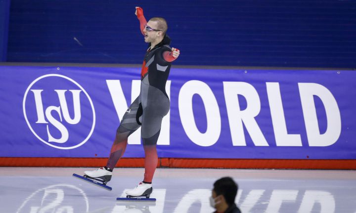 Canada's Laurent Dubreuil celebrates his win in the men's 500-metre competition at the ISU World Cup speed skating event in Calgary, Alta., Friday, Dec. 10, 2021. 