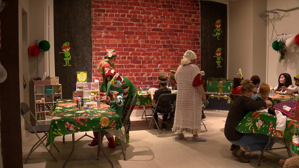 Kids earning their elf certificate at Elf School in Saskatoon.