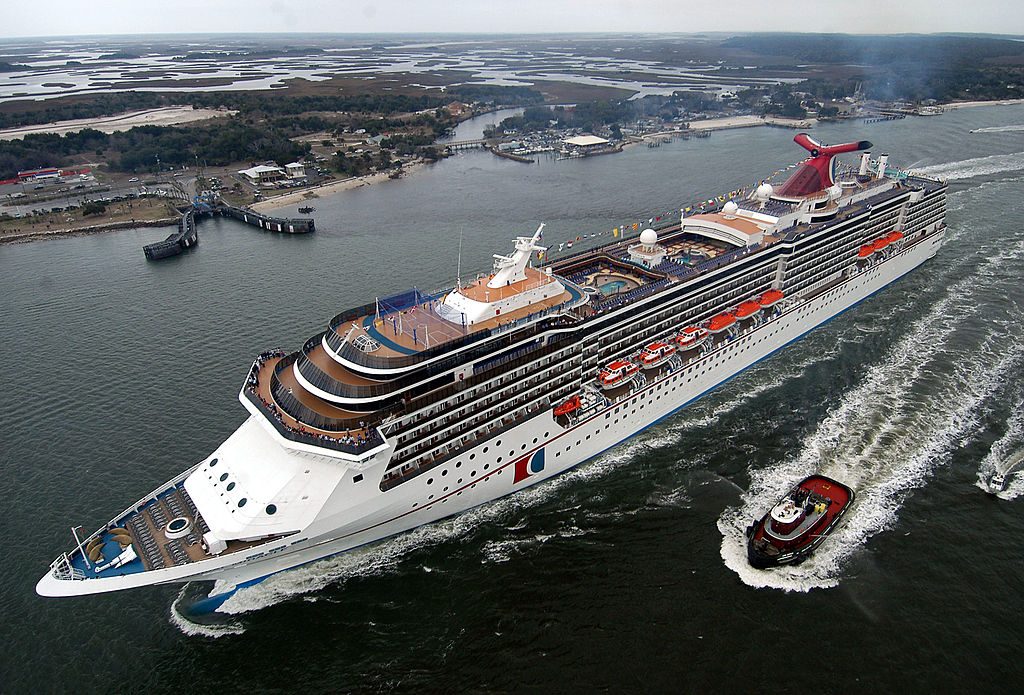 A file photo of the 2,124-passenger Carnival Miracle as it sails up the St. John's River after a trans-Atlantic voyage from its Finnish shipyard Feb. 23, 2004.