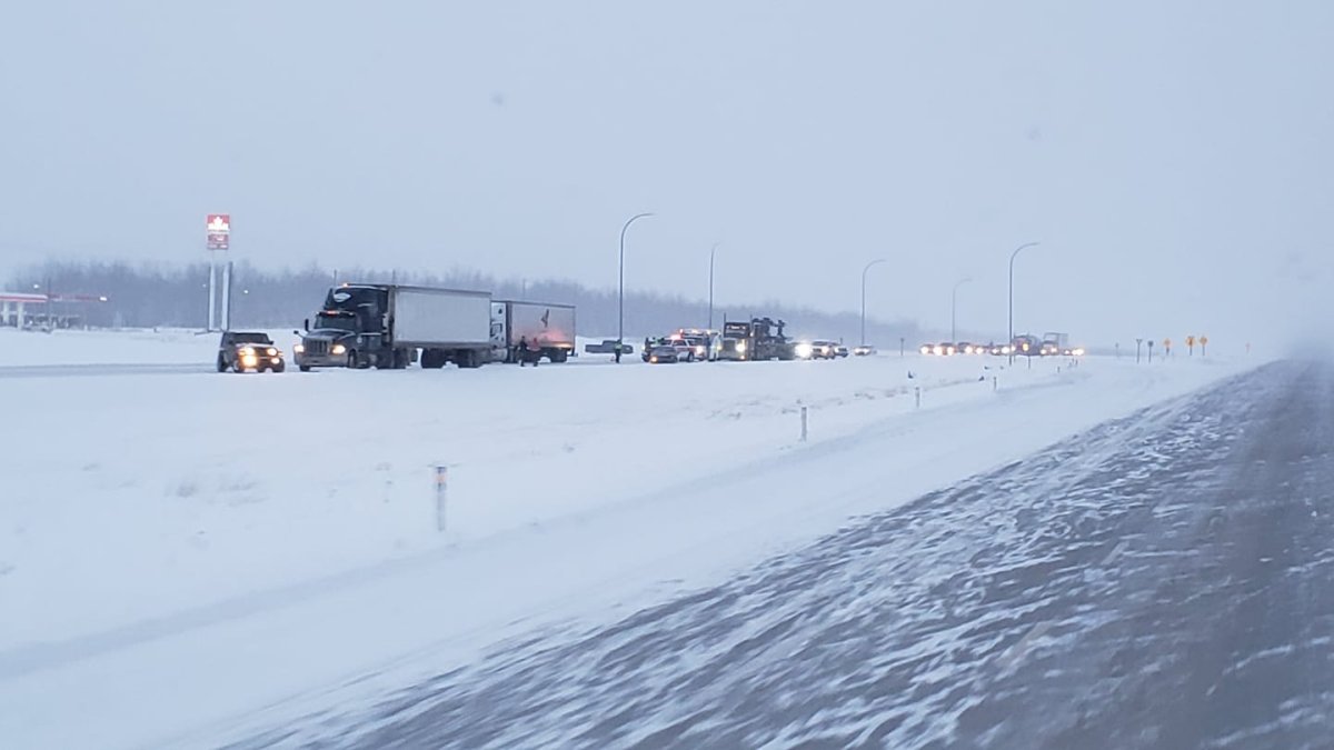 One person is dead after a two-vehicle collision between a car and a semi on Highway 43 northwest of Edmonton Thursday, Dec. 23, 2021.