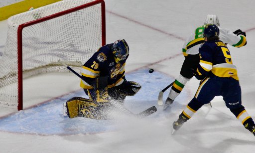 Ruslan Gazizov scores his second goal of the game against Nolan Lalonde of the Erie Otters.
